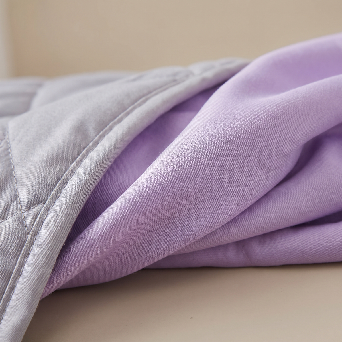 Macro detail of the cool-touch blanket fabric