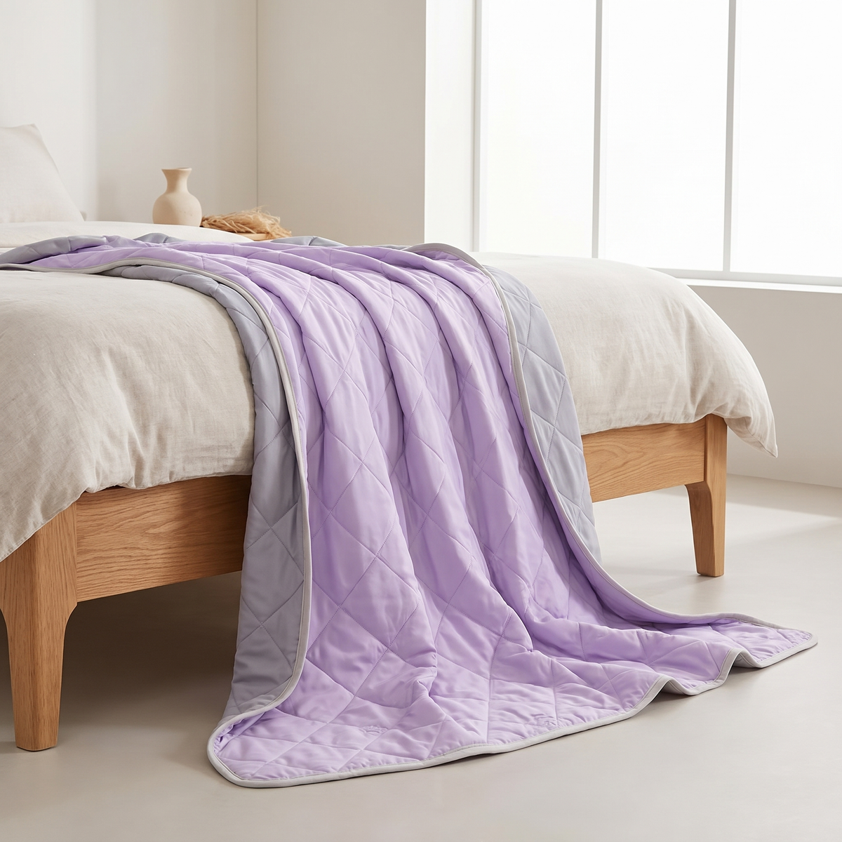 Cooling blanket draped softly showing lightweight feel